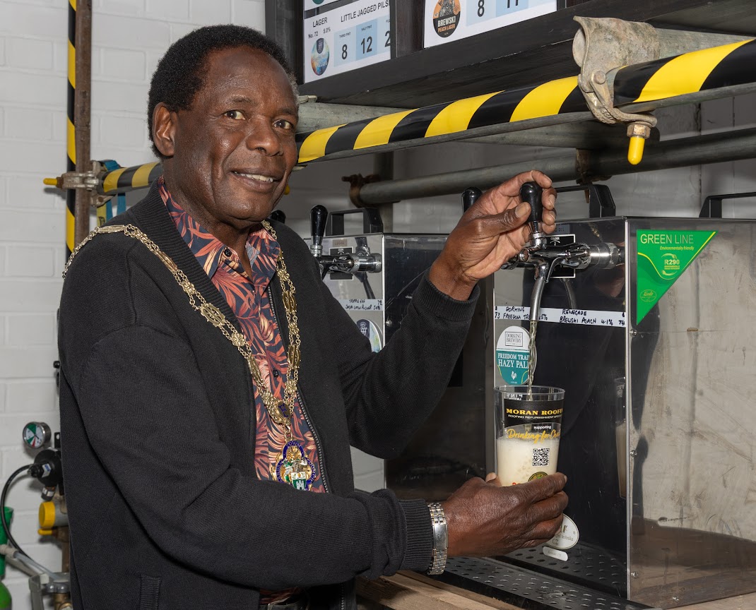 Our mayor pulling a pint!